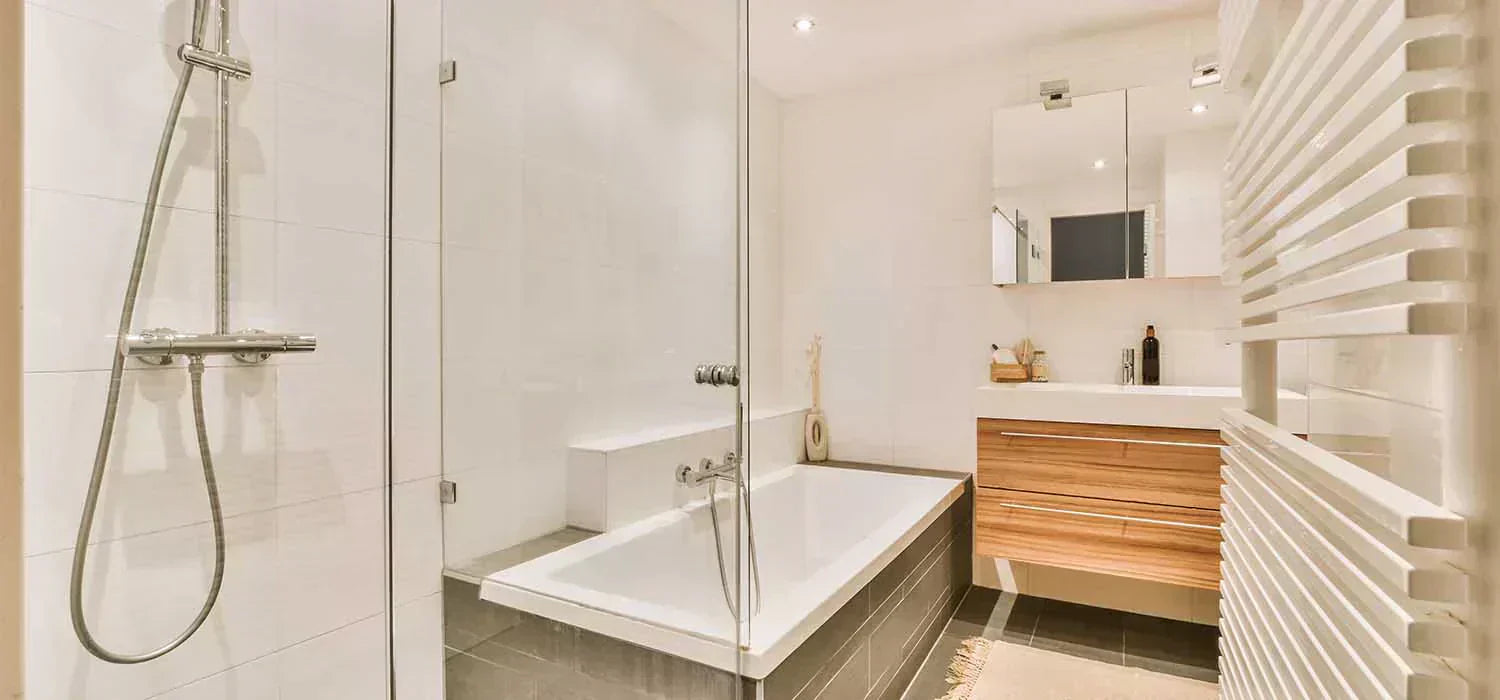 bathtub inside a walking shower 