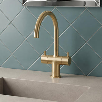 Brushed brass twin lever deck mounted basin tap Main image