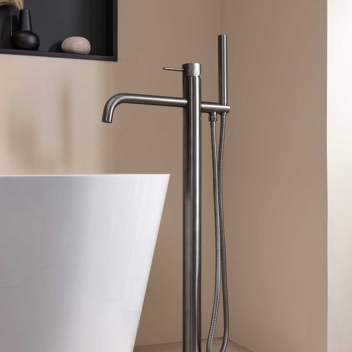 Floor standing bath tap with shower brushed black