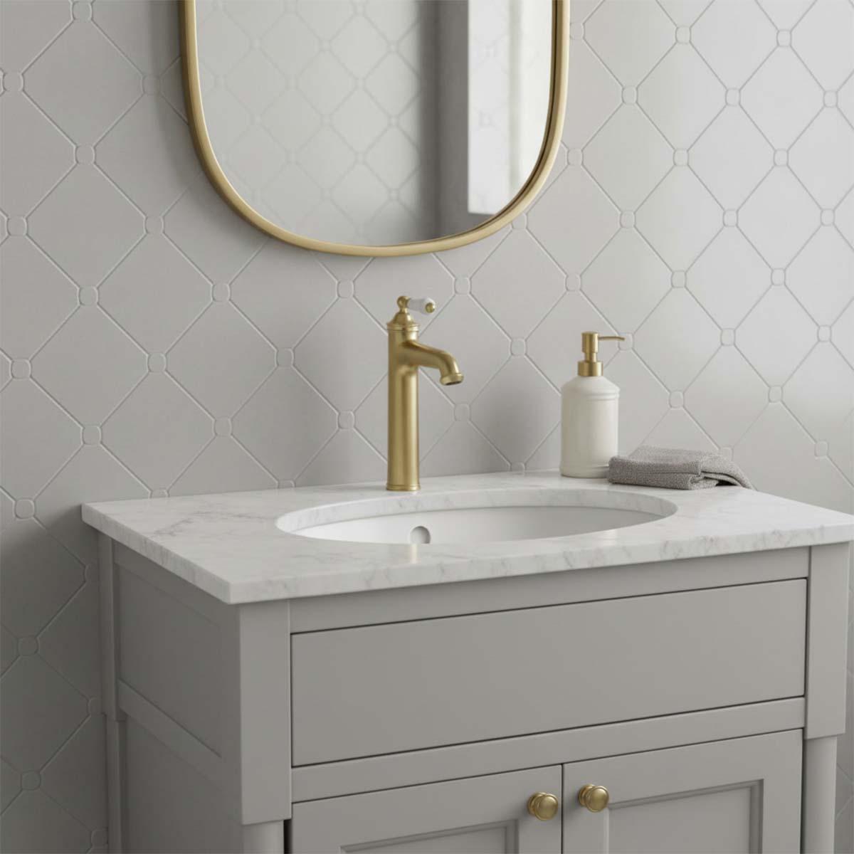Traditional brushed brass high rise basin tap with white cramic handle