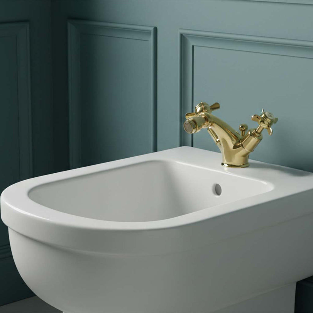 Traditional gold bidet mixer tap with crosshead handles