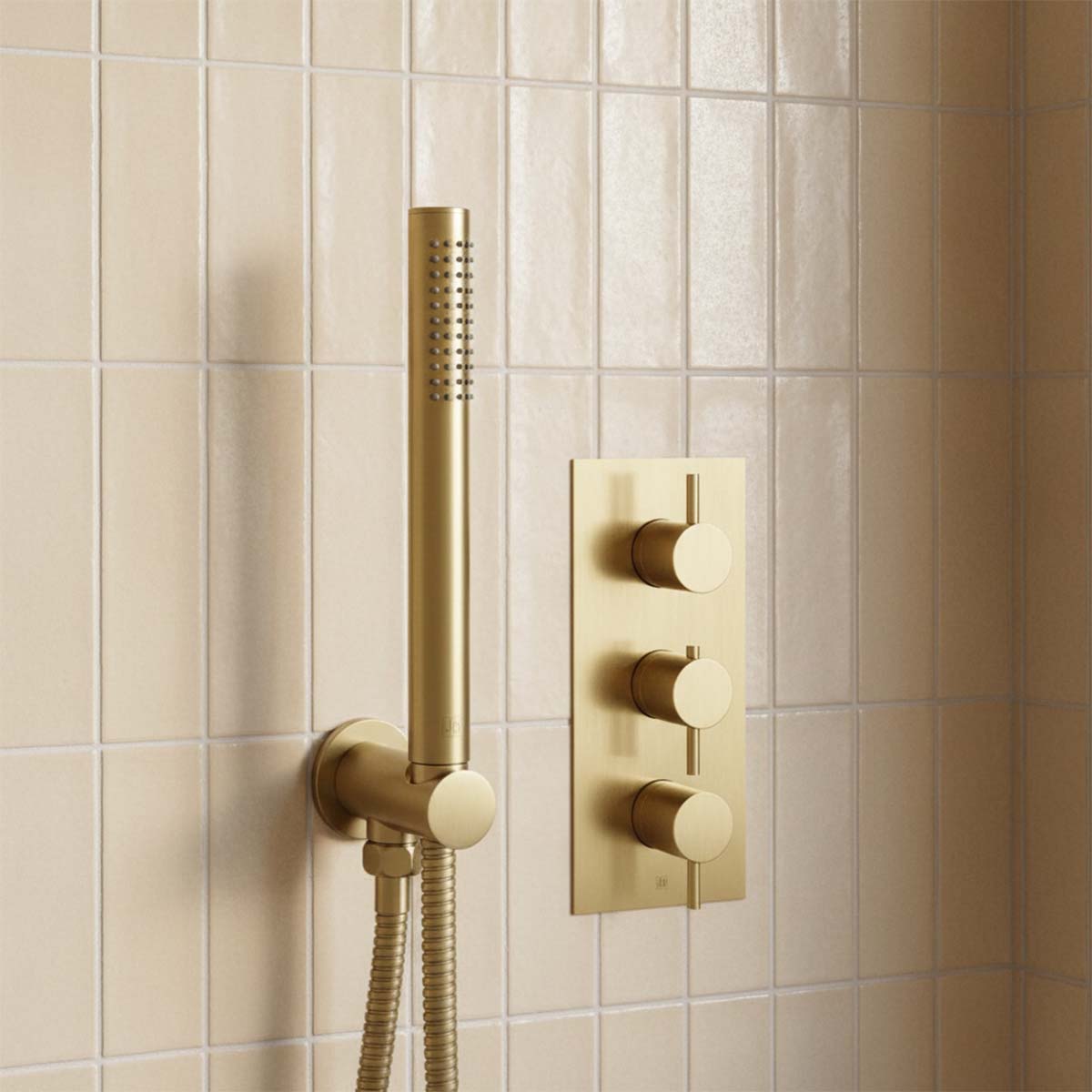 Vertical brushed brass 2 outlet shower valve with three controls 