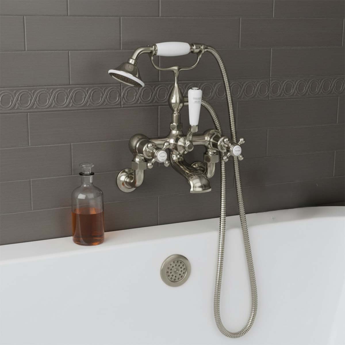 Wall mounted bath tap with shower attachment - brushed nickel 