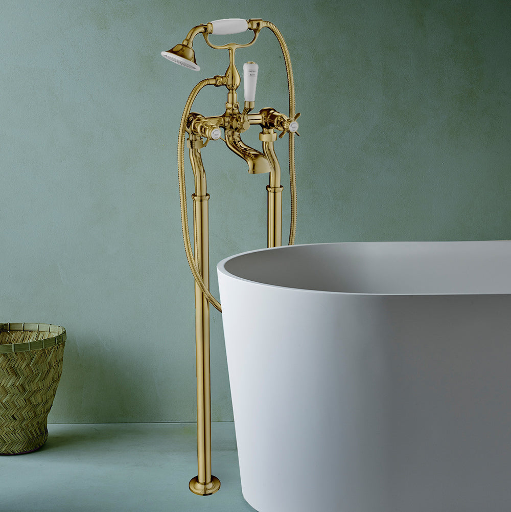 Gold Freestanding Bath Shower Mixer With Kit installed in a modern bathroom