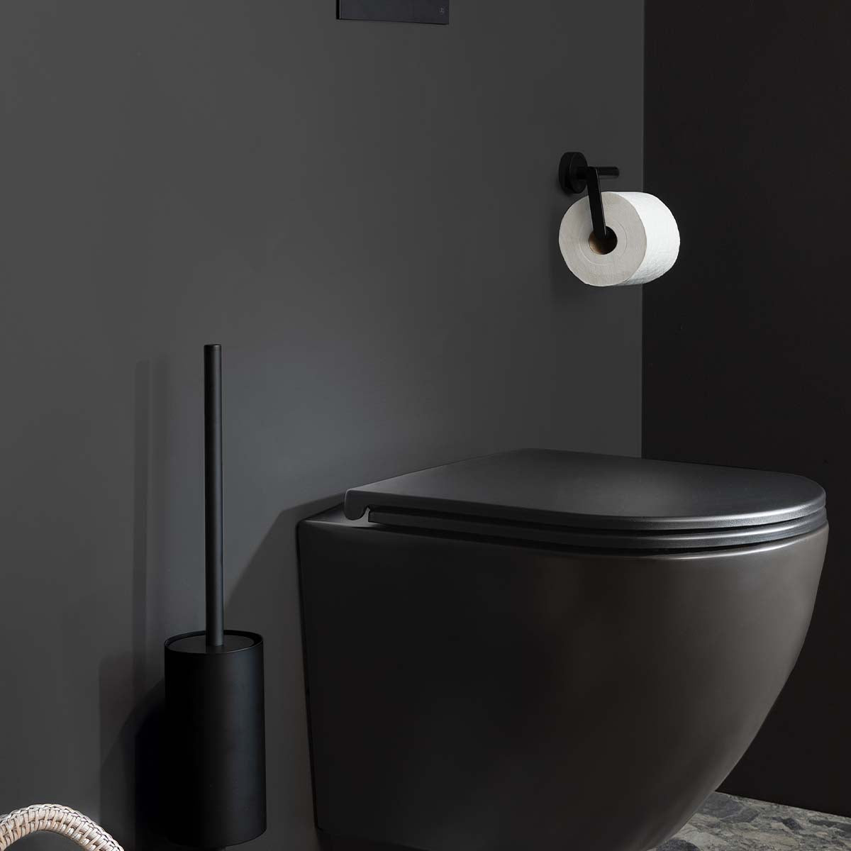 Black toilet with toilet brush holder 