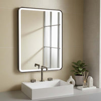 black framed illuminated bathroom mirror