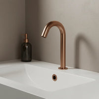 Brushed bronze sensor basin tap
