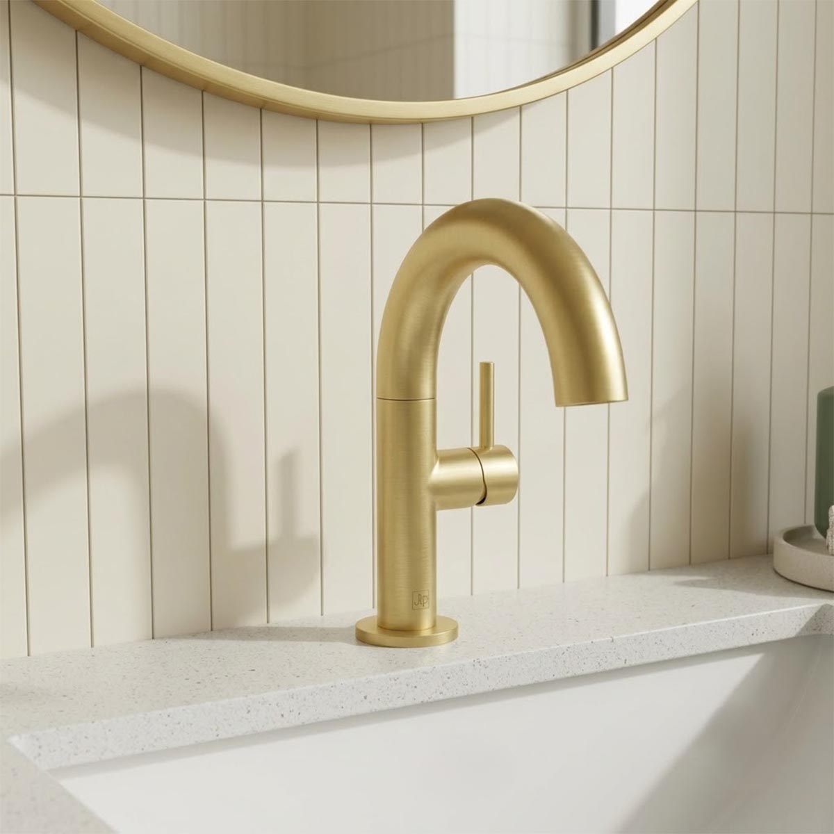 brushed brass basin tap with side lever