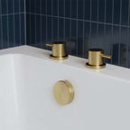 brushed brass deck mounted bath side valves