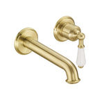 brushed brass single lever basin tap with ceramic lever wall mounted