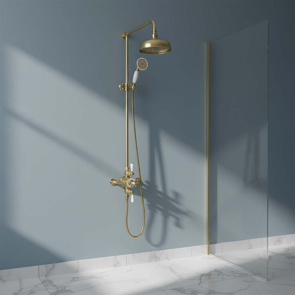 brushed brass traditional  exposed shower rail with fixed head and handset