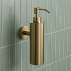 brushed brass wall mounted soap dispenser