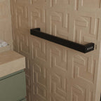 matt black electric heated towel bar with timer and thermostat