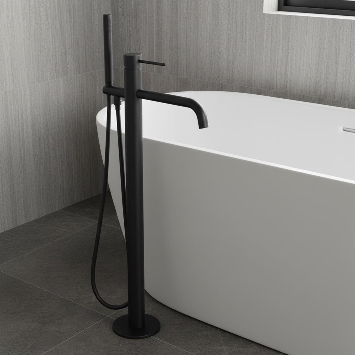 matt black floor standing bath tap with pencil shower handset 