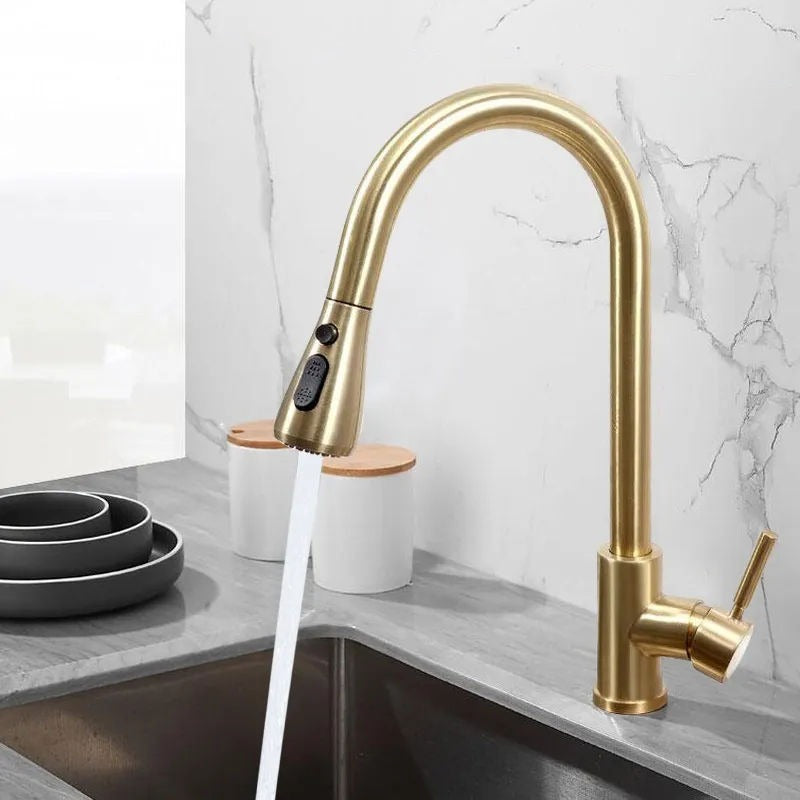 Polished gold kitchen tap with pull out spray