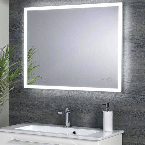 Bathroom Mirror with Heated Pad and Touch Switch Landscape 800mm Length with Aluminium Frame installed on a bathroom wall with a basin tap and a vanity unit underneath the bathroom mirror