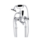 Close-Up of Chester Black Crosshead Floorstanding Bath Shower Mixer with Shower Kit. This statement piece is notable by its sculpted valves, glazed in the twin crosshead levers, wide-mouth bath spout, telephone-style handset shower with hose and linked cradle holder, and bath legs with floor covers for a final touch