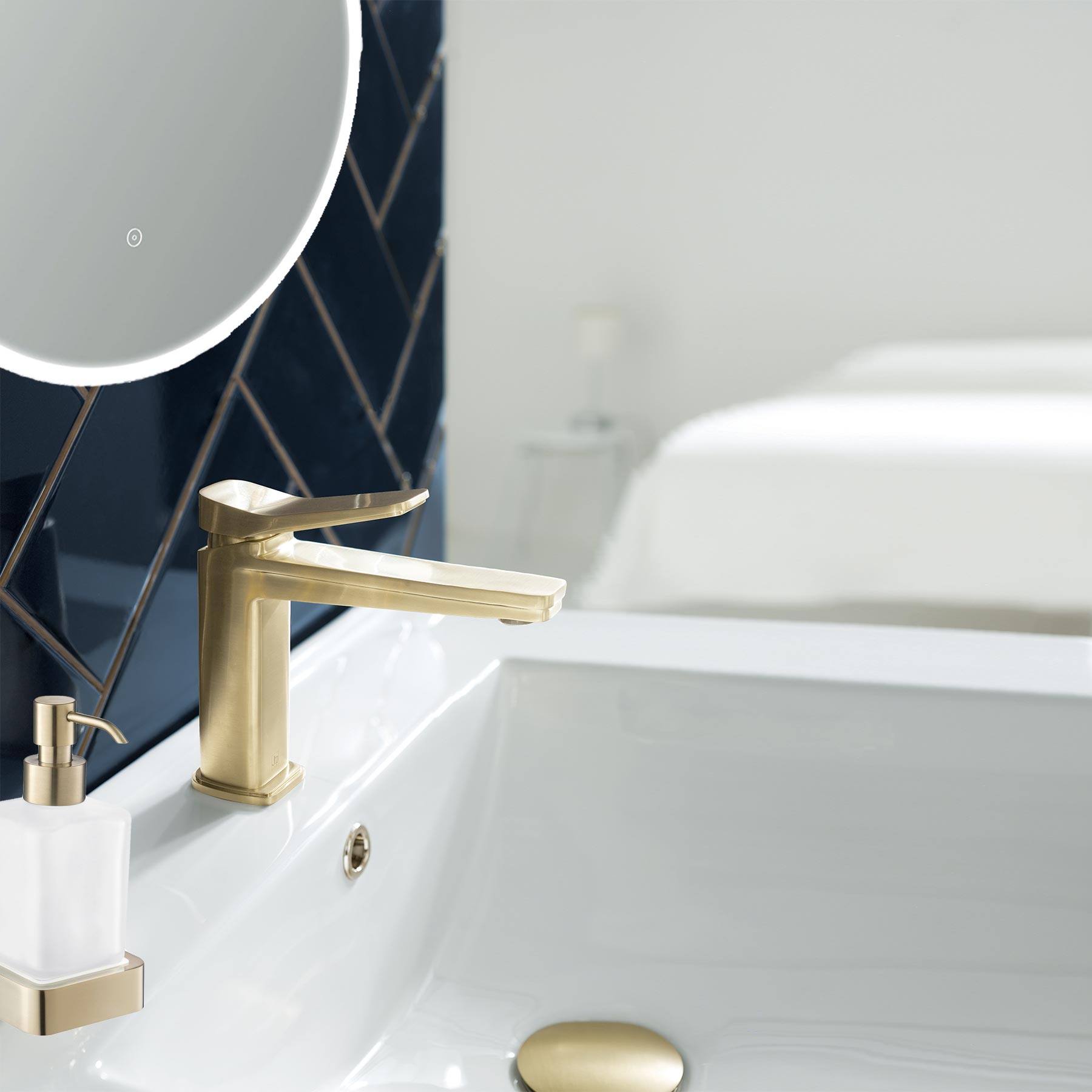 Gold HIX basin mixer with matching gold soap dispenser and gold matching basin waste