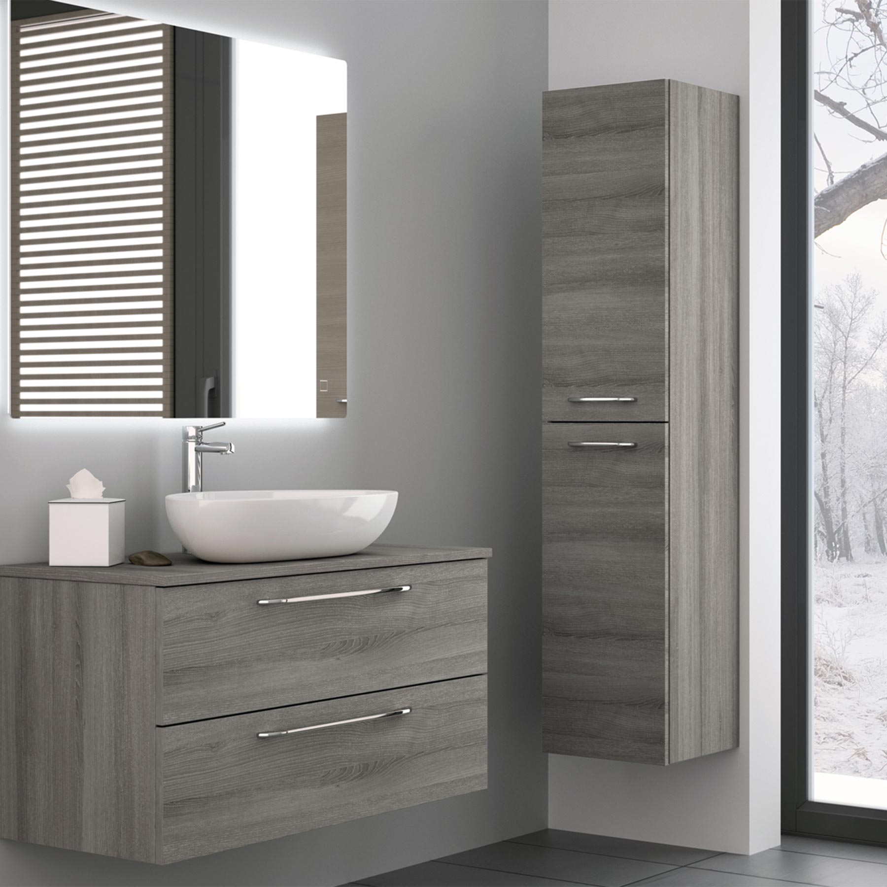 Grey double door side cabinet on a bathroom wall with matching wall mounted bathroom shelves cabinet, white basin and basin sink mixer tap on top and large bathroom mirror above it.