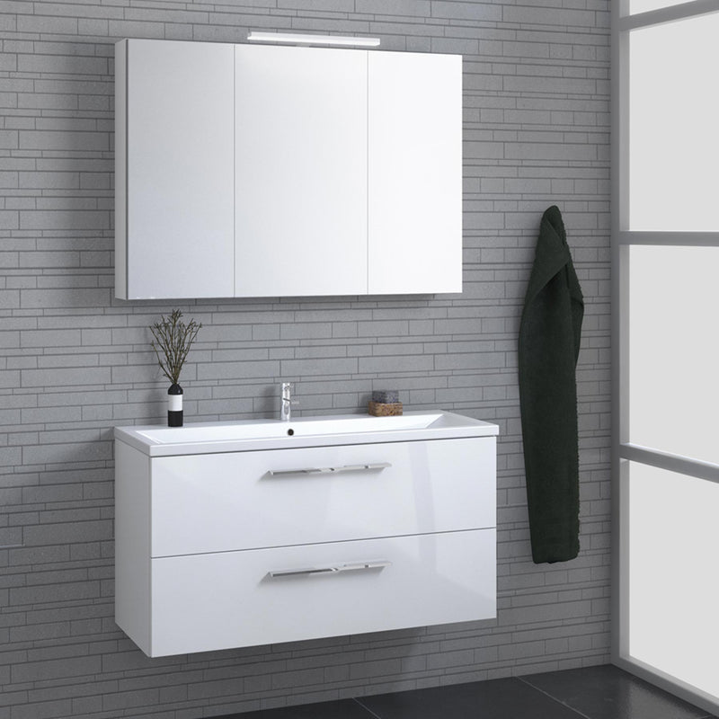 White wall mounted vanity unit 800mm length installed on a bathroom wall with large bathroom mirror above the bathroom  vanity unit 