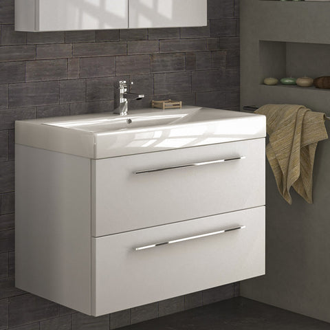 White bathroom wall mounted vanity unit installed in a bathroom